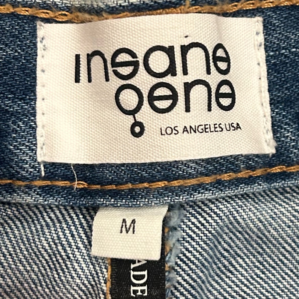 68. Blue and White High-Waisted Jean Shorts with Distressed Detailing - Picture 4 of 6